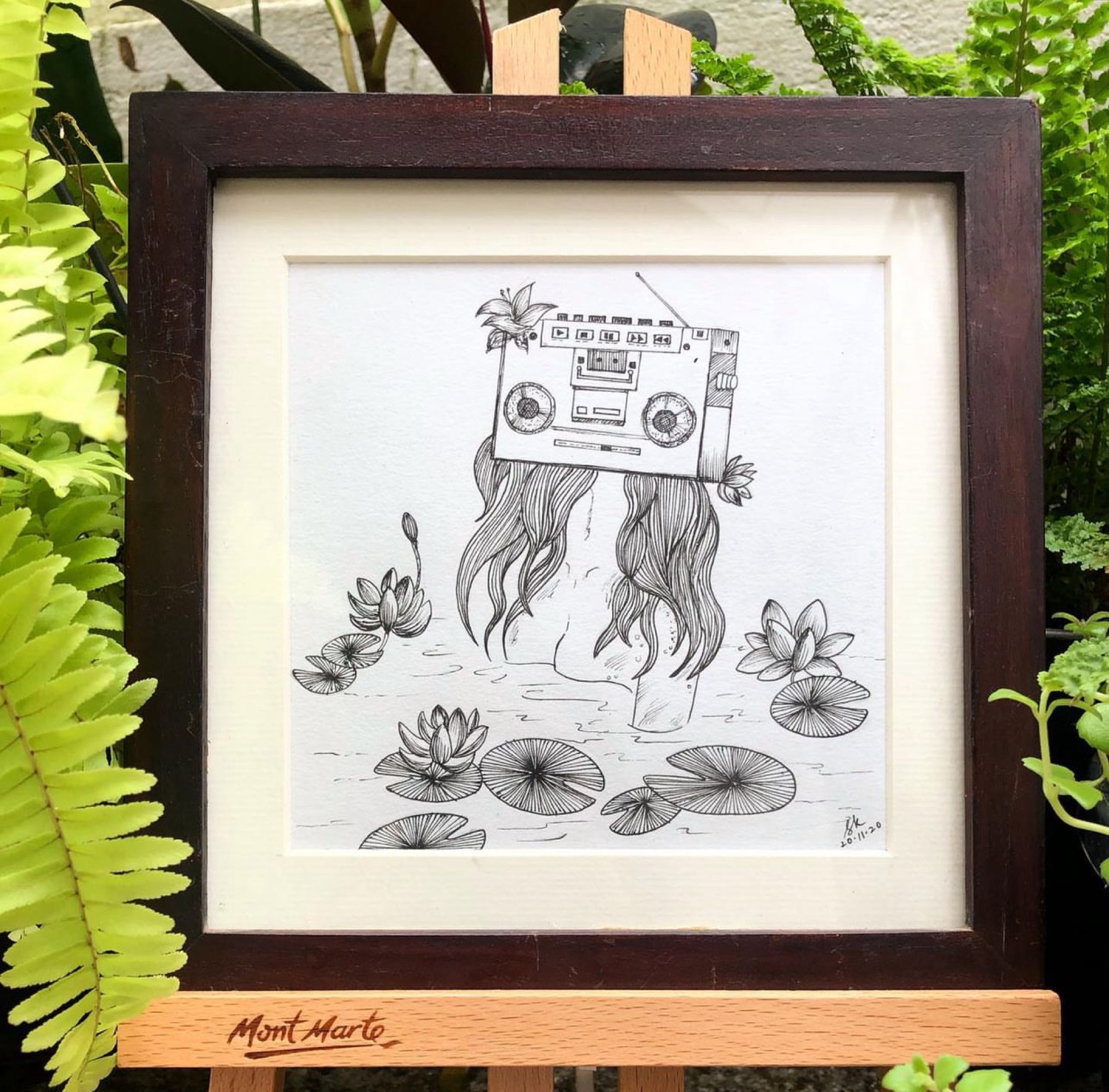 Framed pen illustration of a vintage boombox with flowing hair-like ribbons over a lily pond